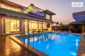 StayVista at Blush Belle - Pool and Wifi